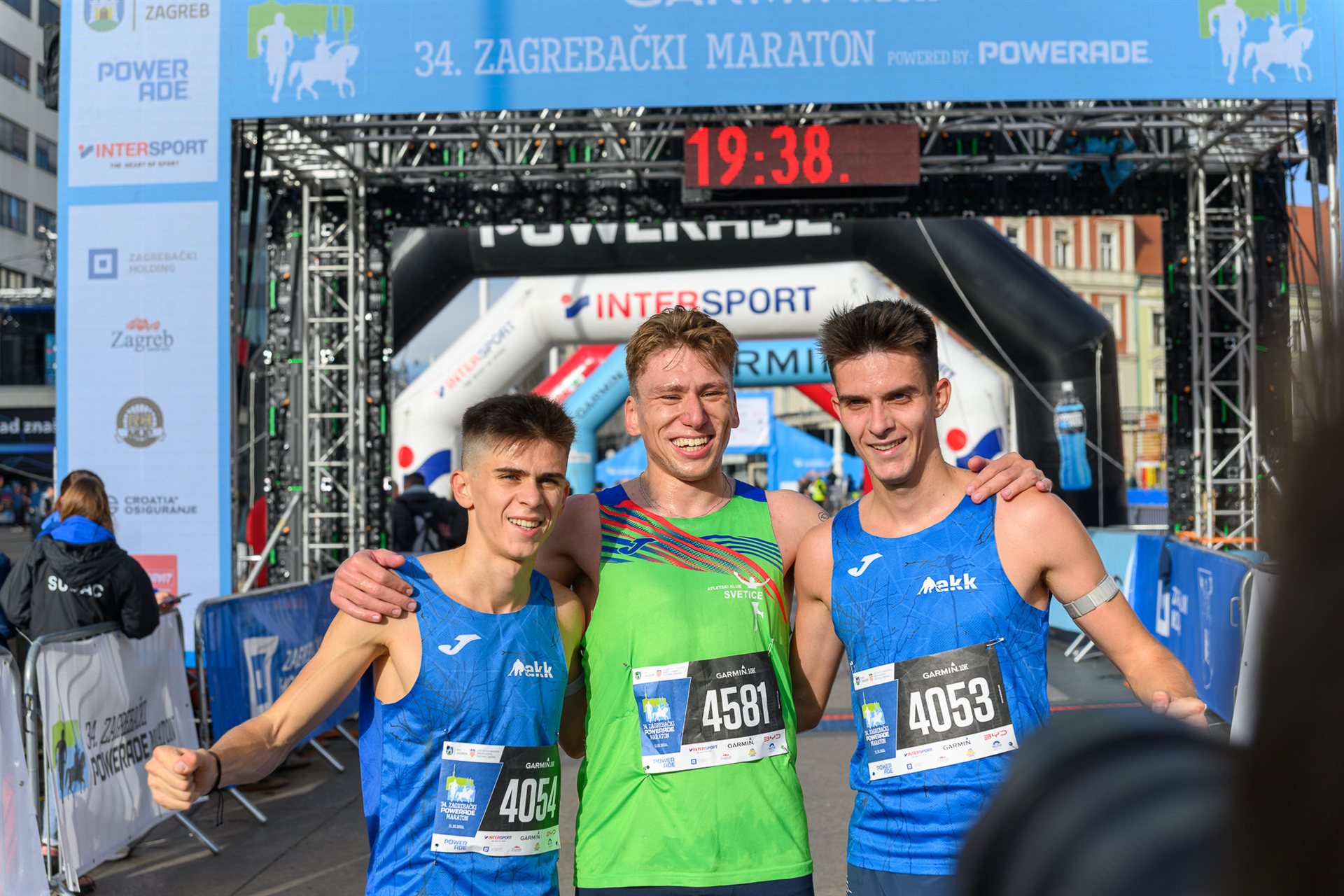 Matko Belčić, Dorian Miškulin and Bruno Belčić at the finish of the Garmin 10K race